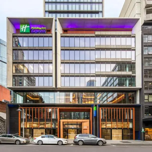 Holiday Inn Express Melbourne Little Collins by IHG to Melbourne Airport premium and luxurious chauffeur service