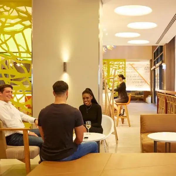 Holiday Inn Express Sydney Macquarie Park by IHG to Sydney Airport (SYD) premium and luxurious chauffeur service